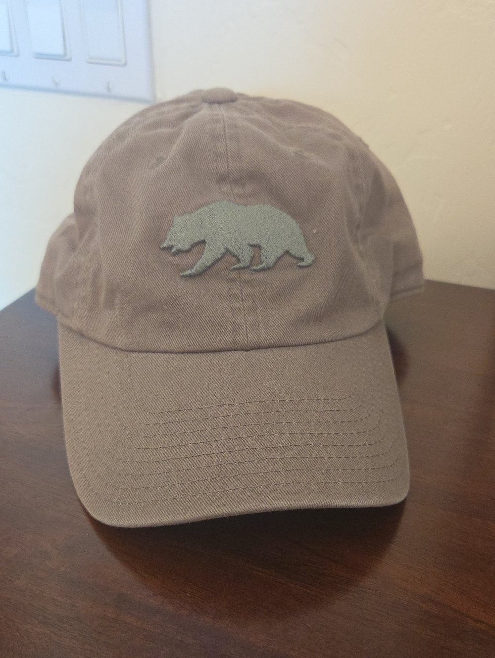 American Needle Ladies Olive Cap with Green Bear Patch
